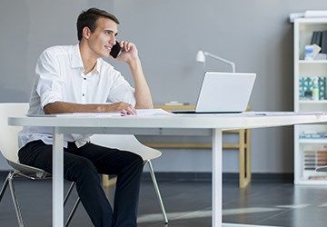 cool idea contestant on phone at desk